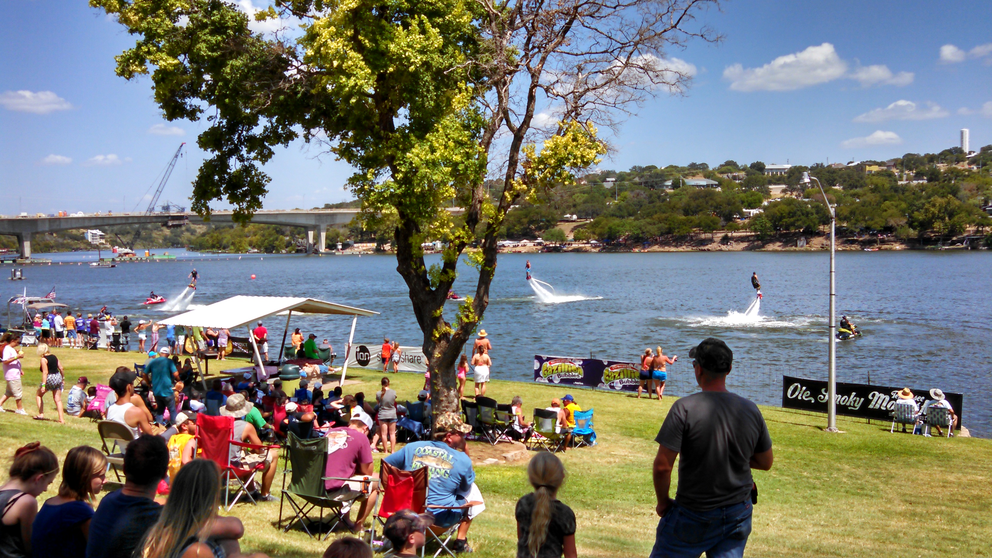 People Jet Boarding on the lake
